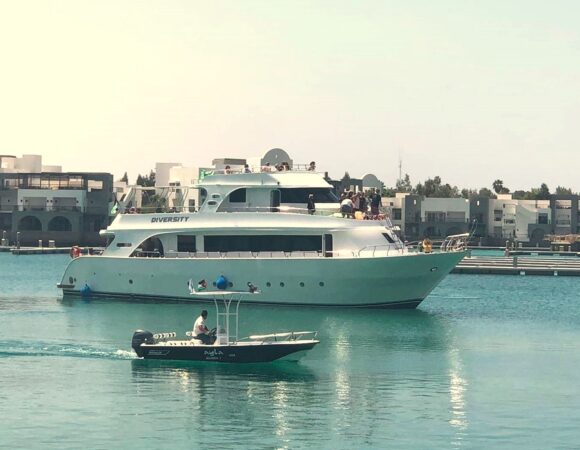 Diversity boat leaving from Ayla harbour for a day trip with divers on board