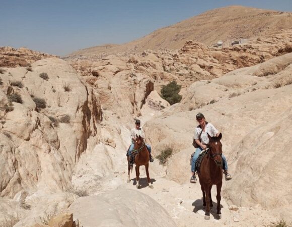 Two horse riders in Little Petra
