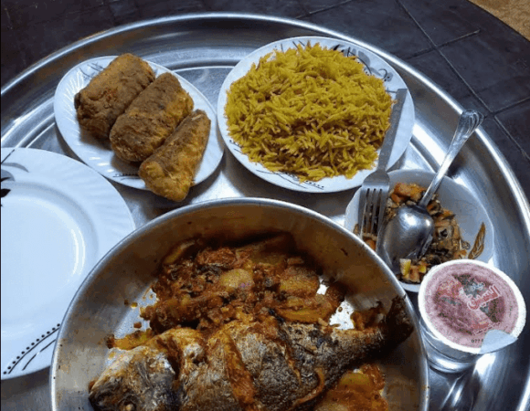Cooking workshop fish dish at local family in Wadi Musa
