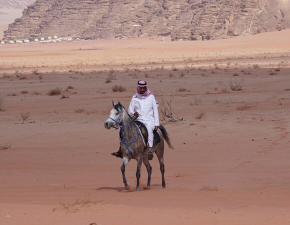 Horse with rider in the Wadi Araba red sand desert with Salma tours